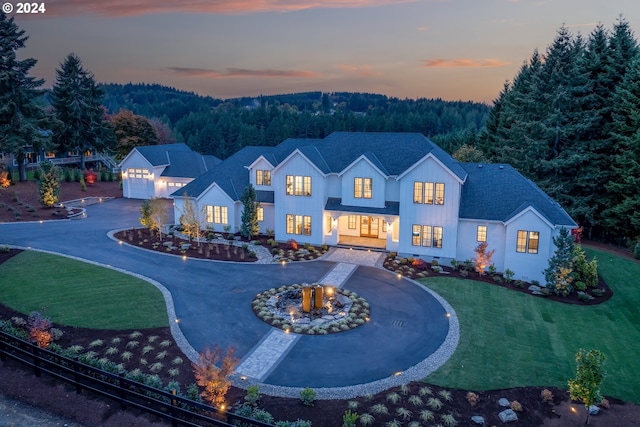 modern farmhouse featuring a yard