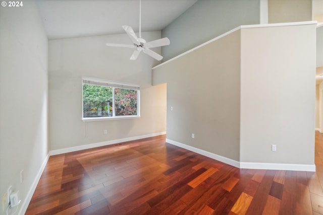 spare room featuring ceiling fan, high vaulted ceiling, and dark hardwood / wood-style flooring