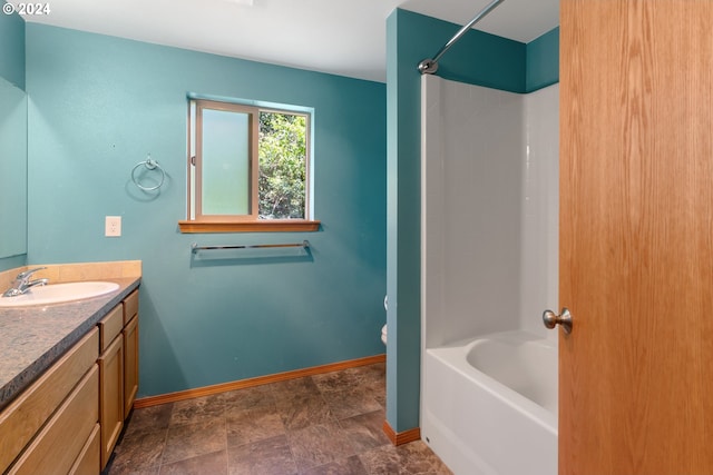 full bathroom with toilet, vanity, and bathtub / shower combination