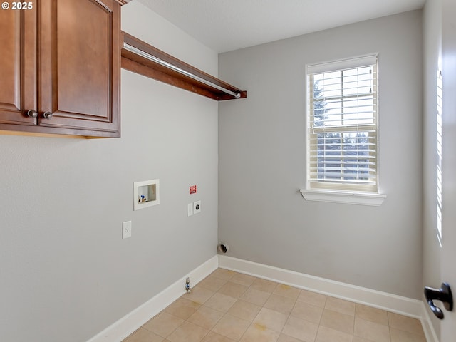 laundry room featuring cabinets, light tile patterned floors, electric dryer hookup, washer hookup, and hookup for a gas dryer