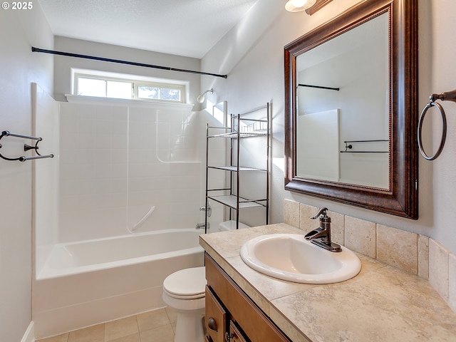 full bathroom with tile patterned flooring, shower / washtub combination, vanity, and toilet