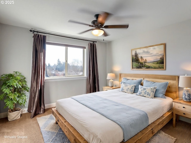 bedroom featuring carpet flooring and ceiling fan