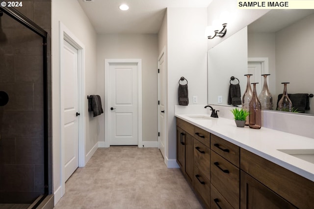 bathroom featuring vanity and walk in shower