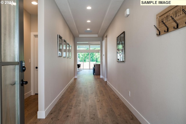 corridor featuring hardwood / wood-style flooring