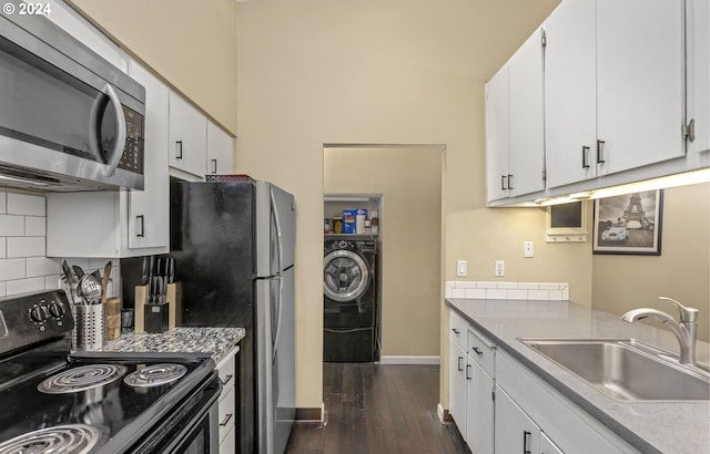 kitchen with black range with electric stovetop, dark wood-type flooring, sink, decorative backsplash, and white cabinets