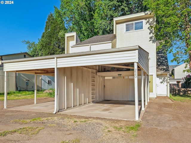 exterior space with a carport