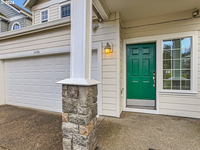 property entrance featuring a garage