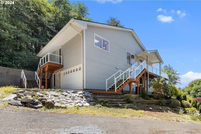 view of property exterior featuring a garage