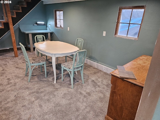 dining room featuring carpet