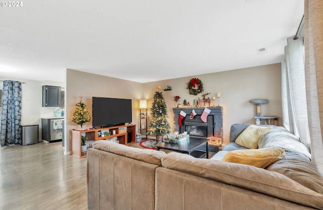 4711 Siesta Ct NE, Salem, OR 97305 - living room featuring light hardwood / wood-style floors and a fireplace