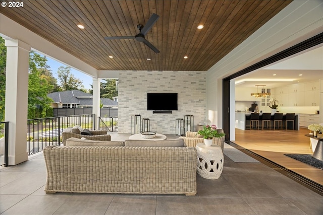 view of patio / terrace featuring ceiling fan and outdoor lounge area