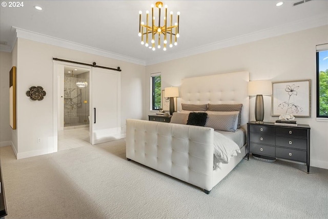 carpeted bedroom with crown molding, ensuite bath, a barn door, and multiple windows