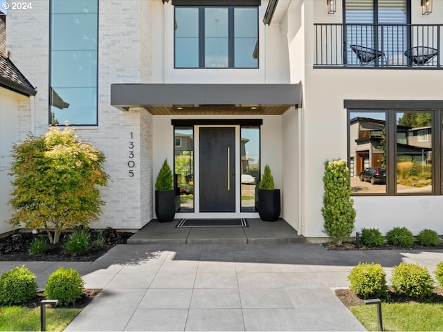 doorway to property with a balcony