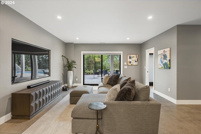 living room with concrete flooring