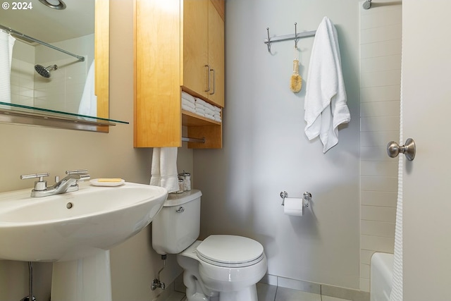 full bathroom with shower / bath combination, toilet, tile flooring, and sink