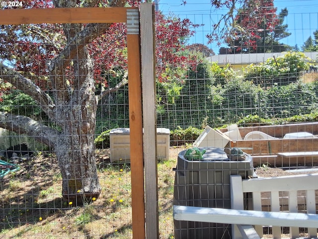 view of property hidden behind natural elements