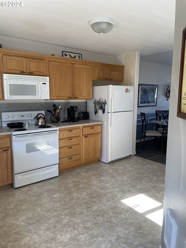 kitchen featuring white appliances