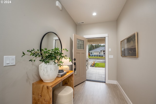 entrance foyer featuring hardwood / wood-style flooring