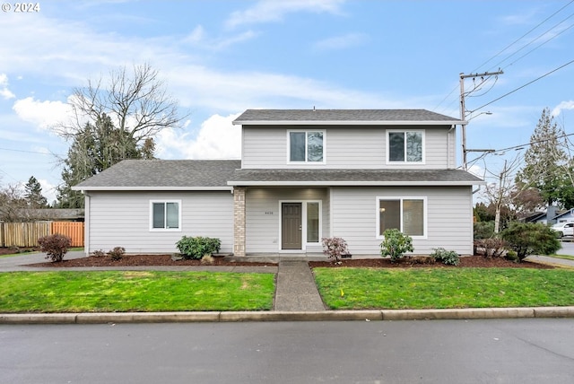 view of front property with a front lawn