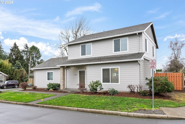 front of property with a front lawn