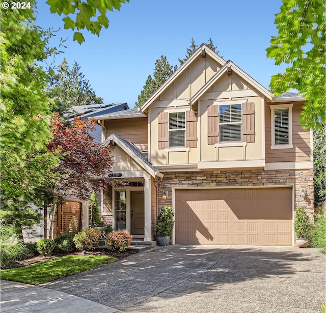 view of front of property featuring a garage