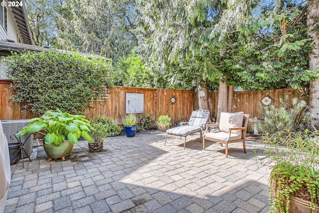 view of patio with cooling unit