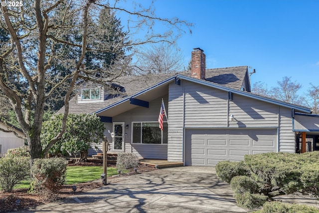 view of front facade featuring driveway and a chimney