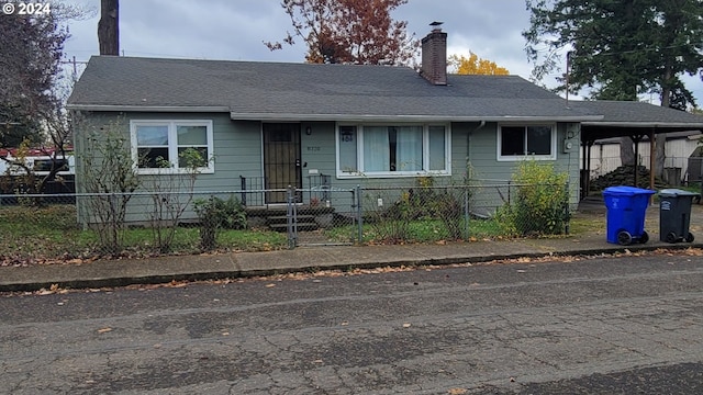 view of front of house featuring a carport