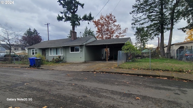 view of front facade featuring a carport