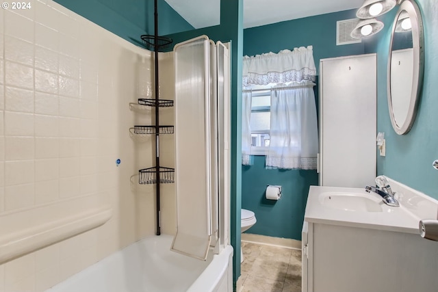 full bathroom featuring toilet, vanity, bathing tub / shower combination, and tile patterned flooring