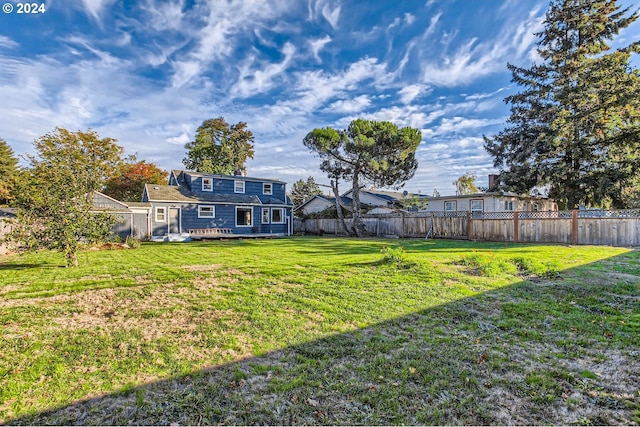 view of yard with a deck