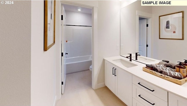 full bathroom with vanity, shower / washtub combination, and toilet