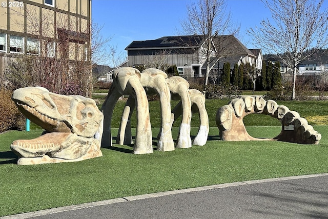 community sign with a lawn