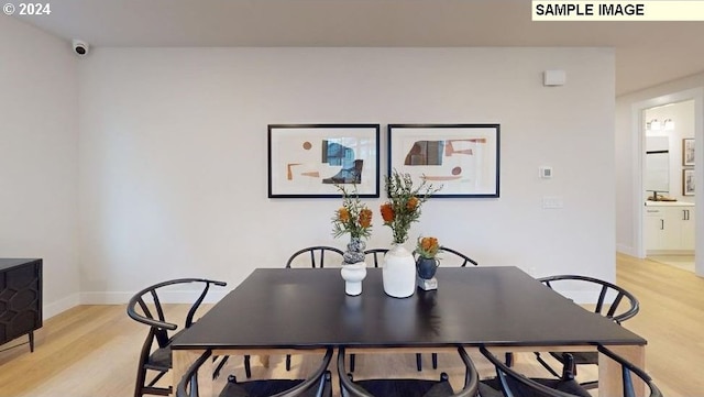 dining room featuring light hardwood / wood-style flooring