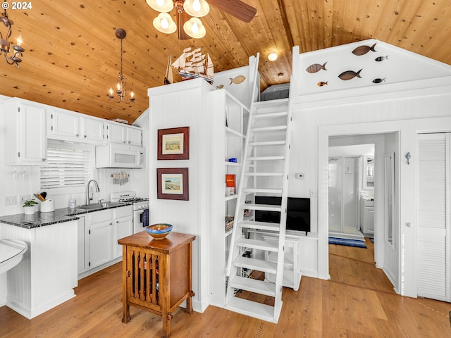 kitchen with white appliances, wooden ceiling, vaulted ceiling, white cabinets, and light hardwood / wood-style flooring