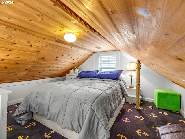 bedroom featuring wooden ceiling, dark carpet, and vaulted ceiling