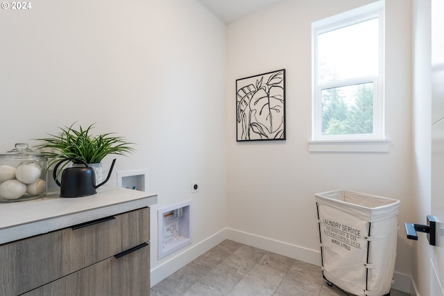 washroom featuring hookup for an electric dryer and washer hookup