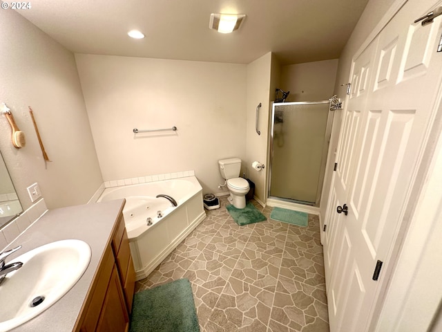 146 28th St, Long Beach, WA 98631 - full bathroom featuring a shower stall, toilet, vanity, a jetted tub, and recessed lighting
