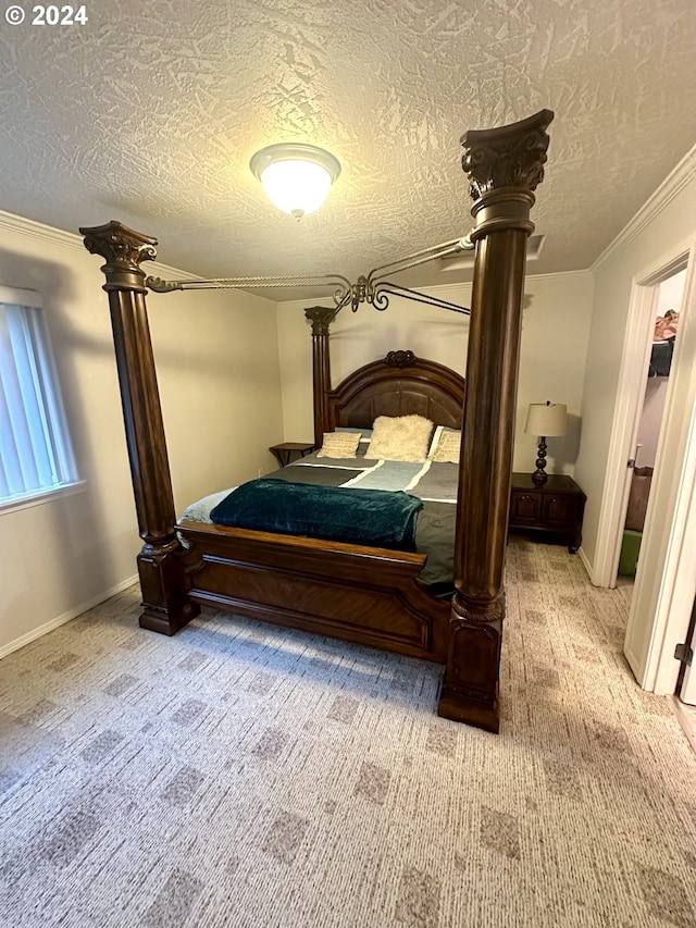 146 28th St, Long Beach, WA 98631 - bedroom with light carpet, a textured ceiling, ornamental molding, and baseboards