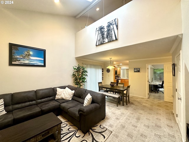 146 28th St, Long Beach, WA 98631 - living room with a towering ceiling, light carpet, baseboards, crown molding, and recessed lighting
