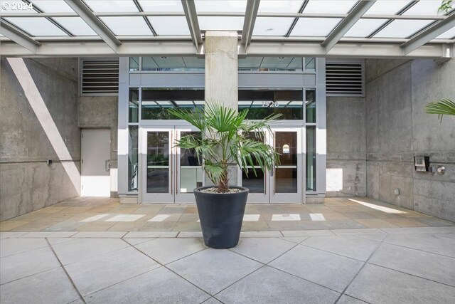 doorway to property featuring a patio