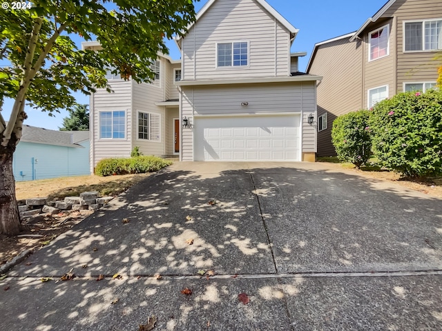 view of front of property featuring a garage