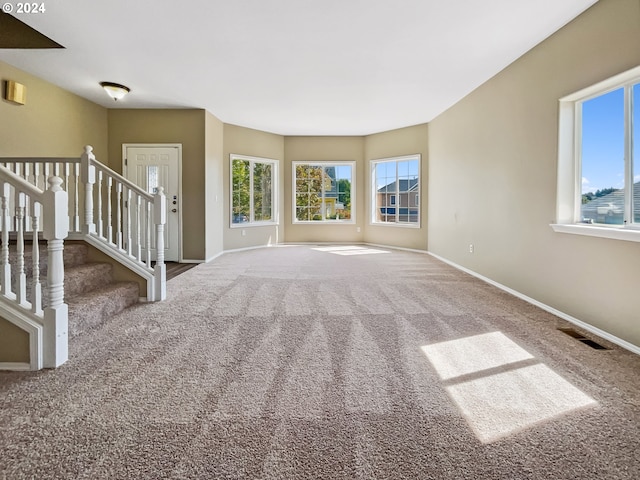 empty room with carpet flooring