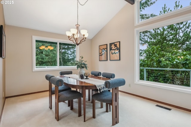 dining area with light colored carpet, visible vents, lofted ceiling, and baseboards