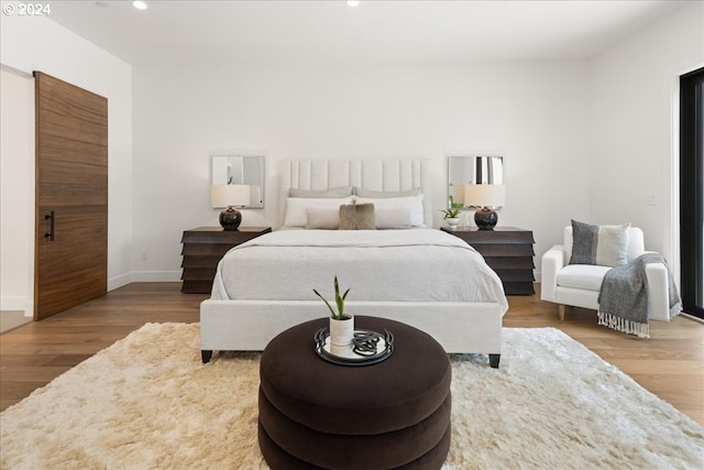 bedroom featuring hardwood / wood-style flooring