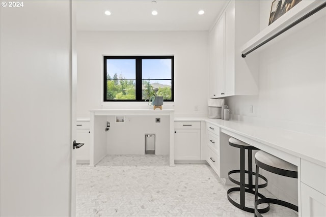 laundry room featuring washer hookup and hookup for an electric dryer