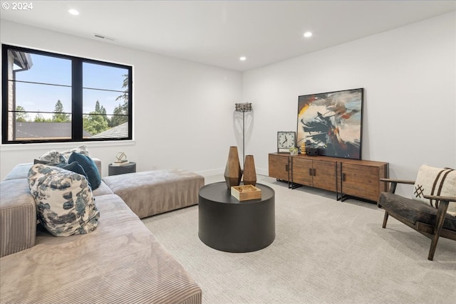 bedroom featuring light carpet