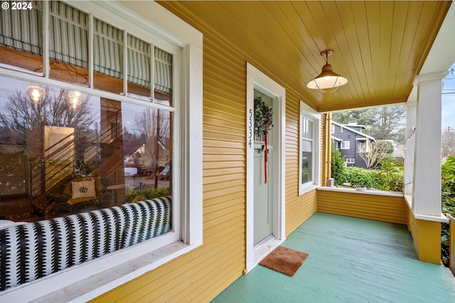 sunroom / solarium with wooden ceiling