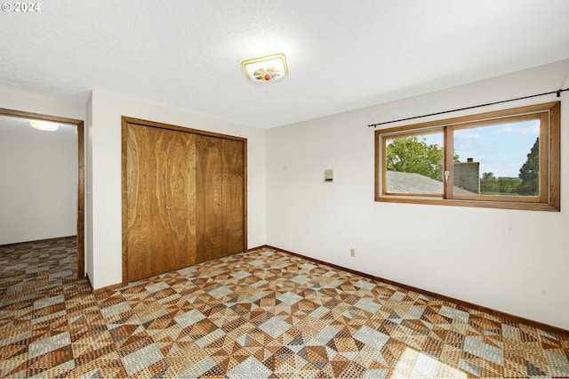 unfurnished bedroom with a closet