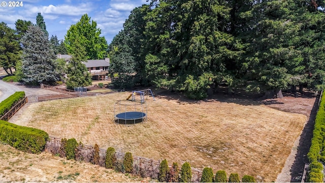 view of yard with an outdoor fire pit